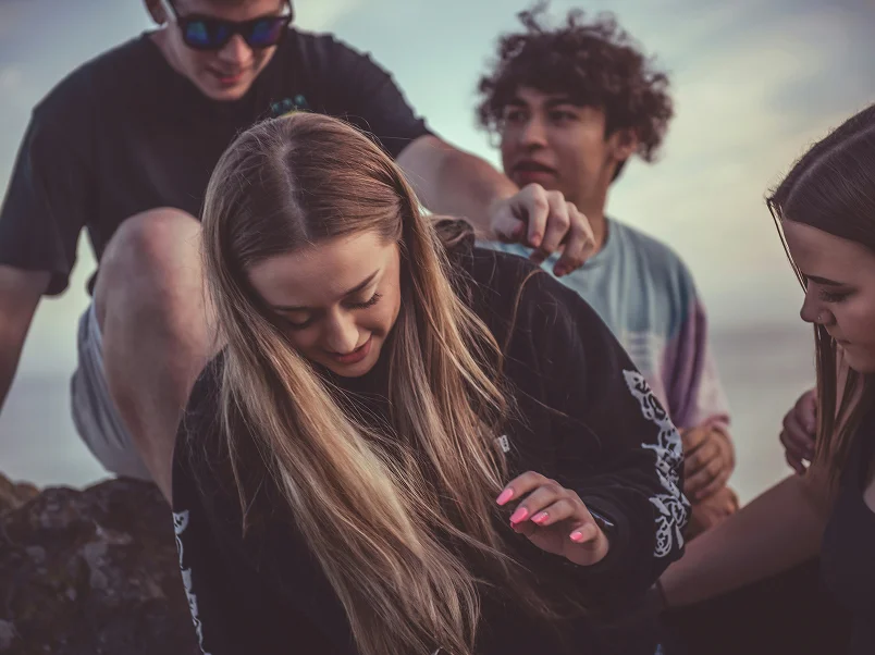 Youth climbing outdoors